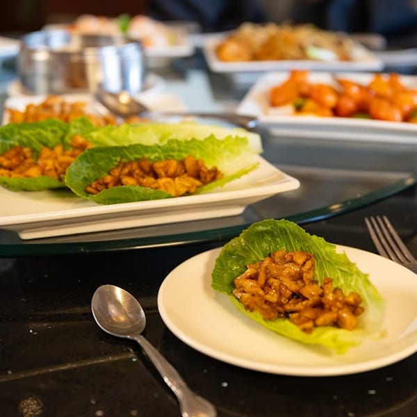 Shanghai Garden's chicken lettuce wraps and other Chinese dishes on a buffet line.